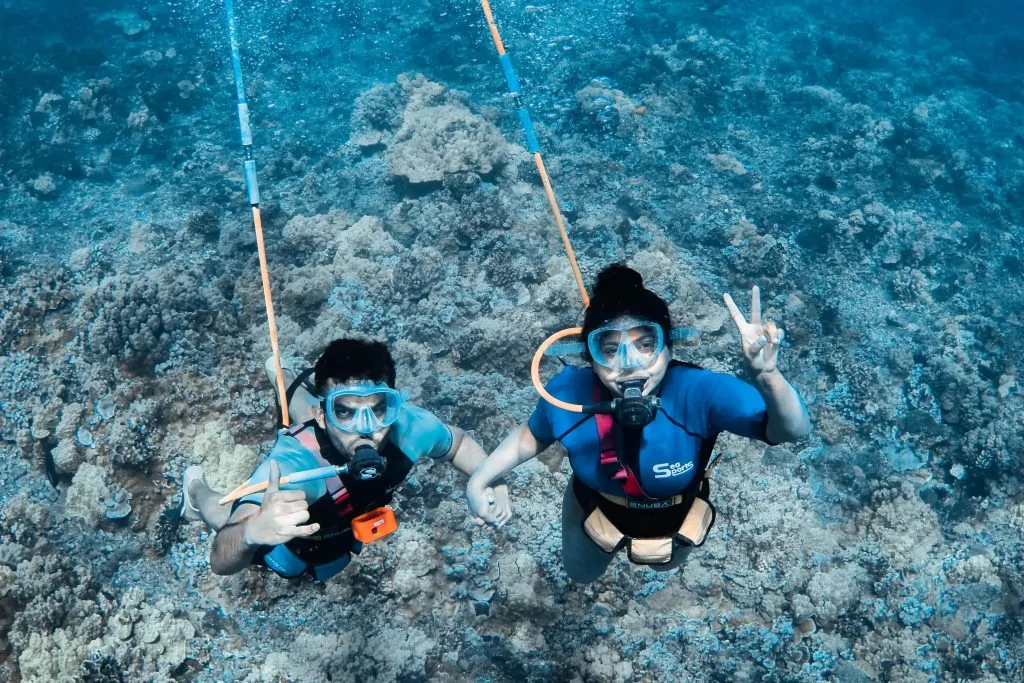 Chaitra and Sunkist, the bloggers behind Mad Over Explorer, snorkeling.