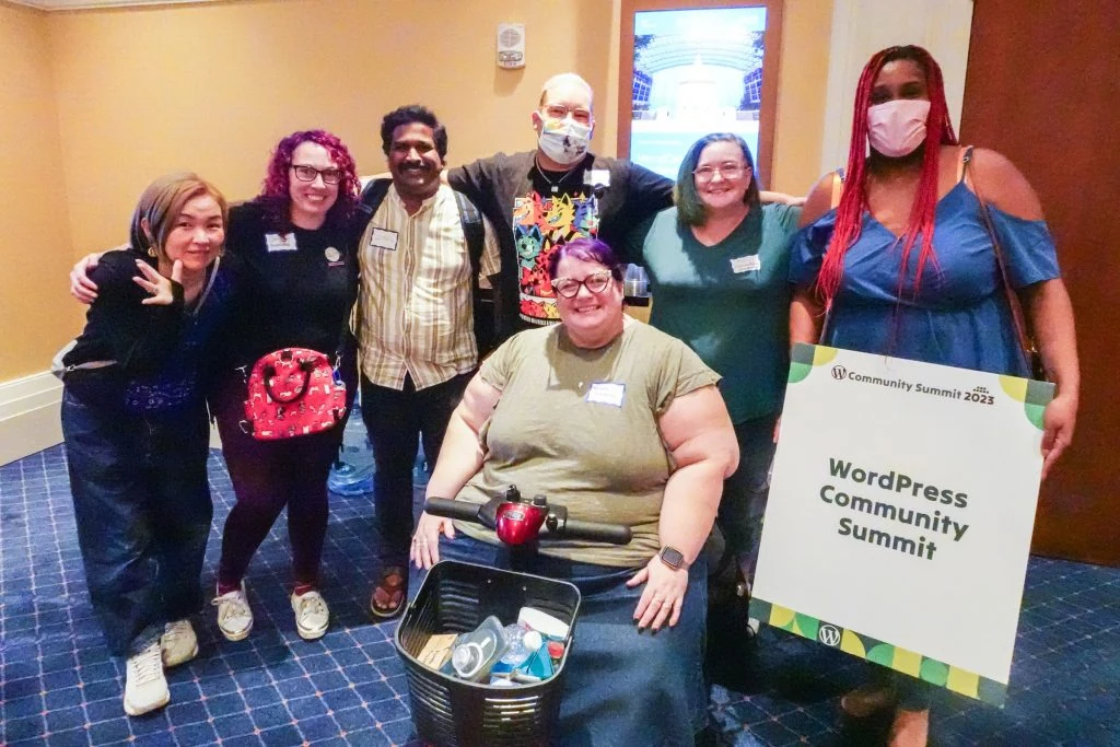 Mimi and fellow WordPress community members at the 2023 Community Summit