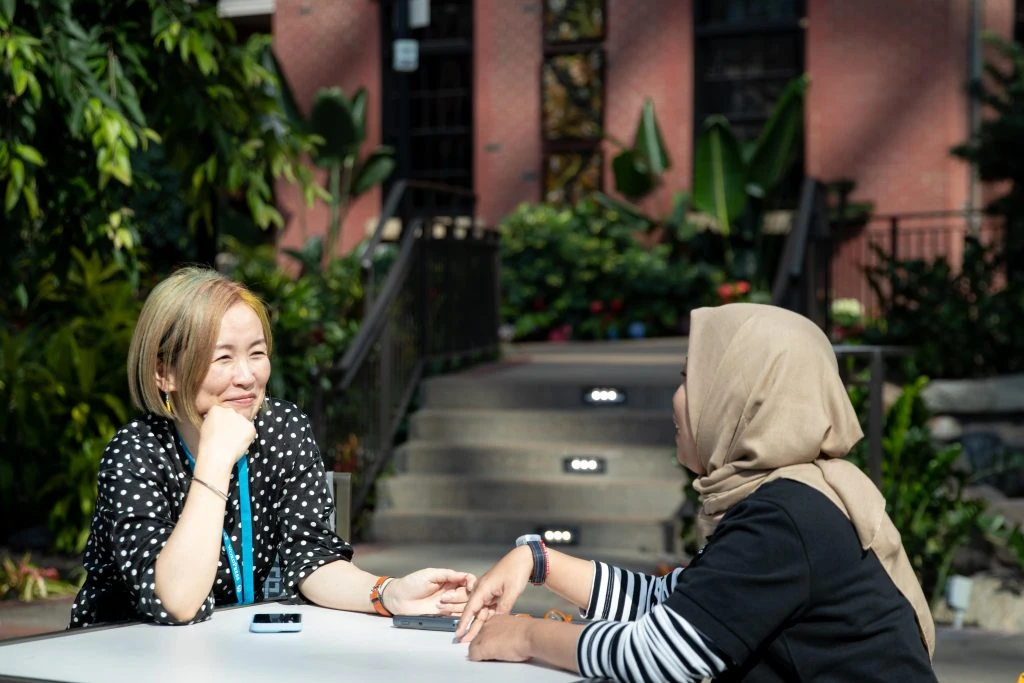 Mimi and Hostinger content writer Nadia Maya Ardiani during their interview session at WordCamp US 2023