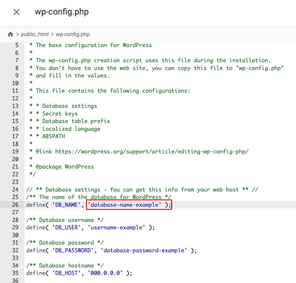 El editor del Administrador de archivos de Hostinger, con el nombre de la base de datos resaltado en wp-config