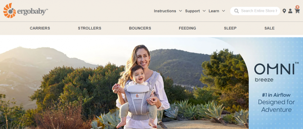 Một trang trên trang web Ergobaby giới thiệu địu em bé Omni Breeze của họ với ảnh một người phụ nữ đang bế em bé đang sử dụng sản phẩm.