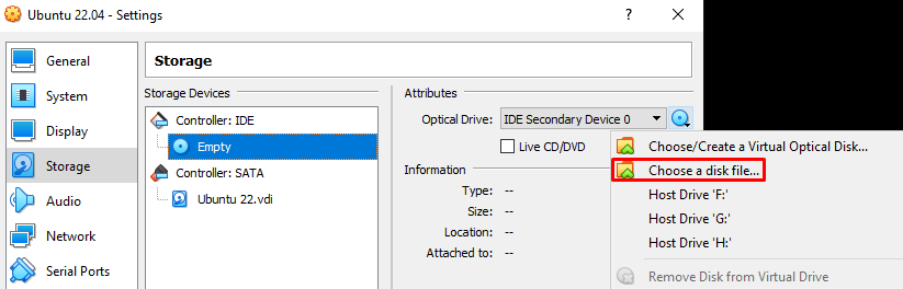 VirtualBox window showing how to mount ISO file to DVD drive