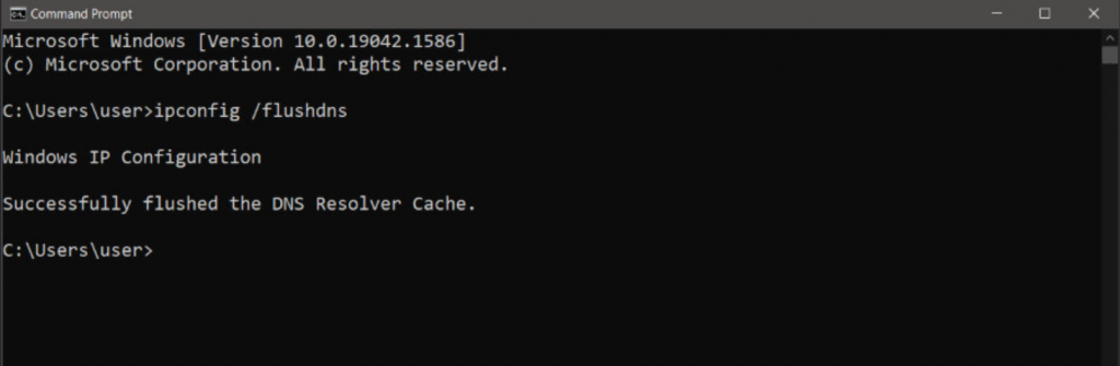 The Command Prompt window showing how to flush DNS