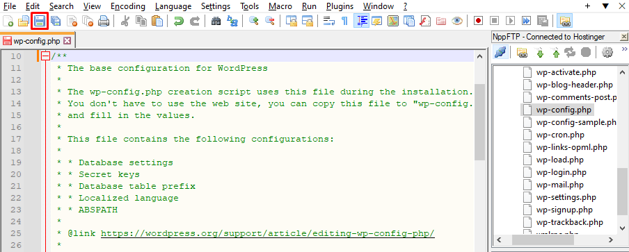 Editing a wp-config.php file in Notepad++, with the Save button highlighted