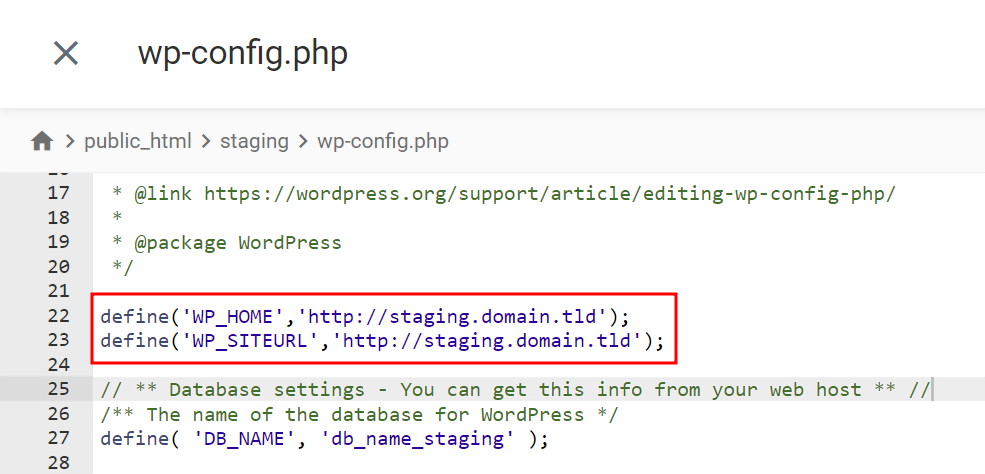 The content of wp-config.php file, highlighting the syntax to define the staging site URL

