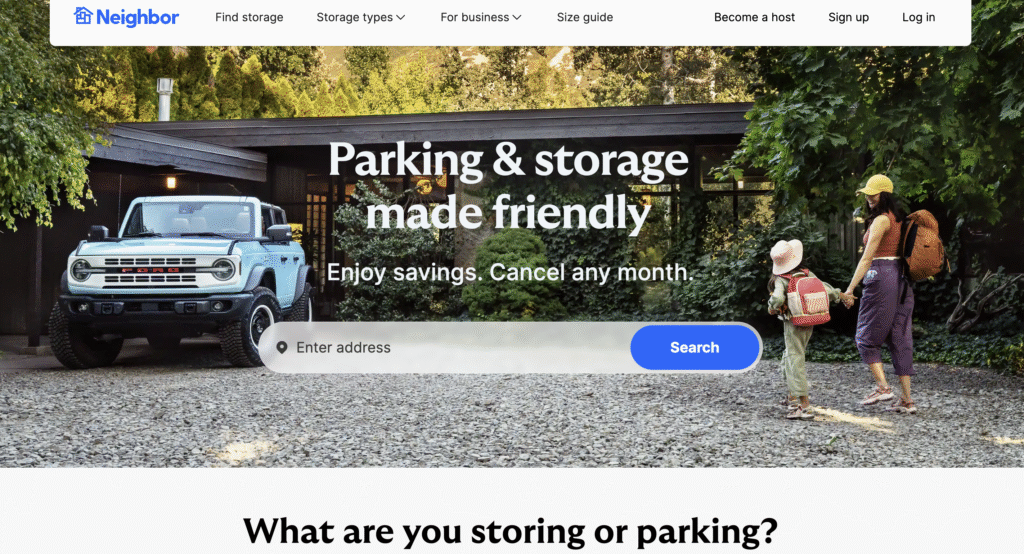 Neighbor homepage showing a driveway parking scene and the headline &ldquo;Parking & storage made friendly.&rdquo;
