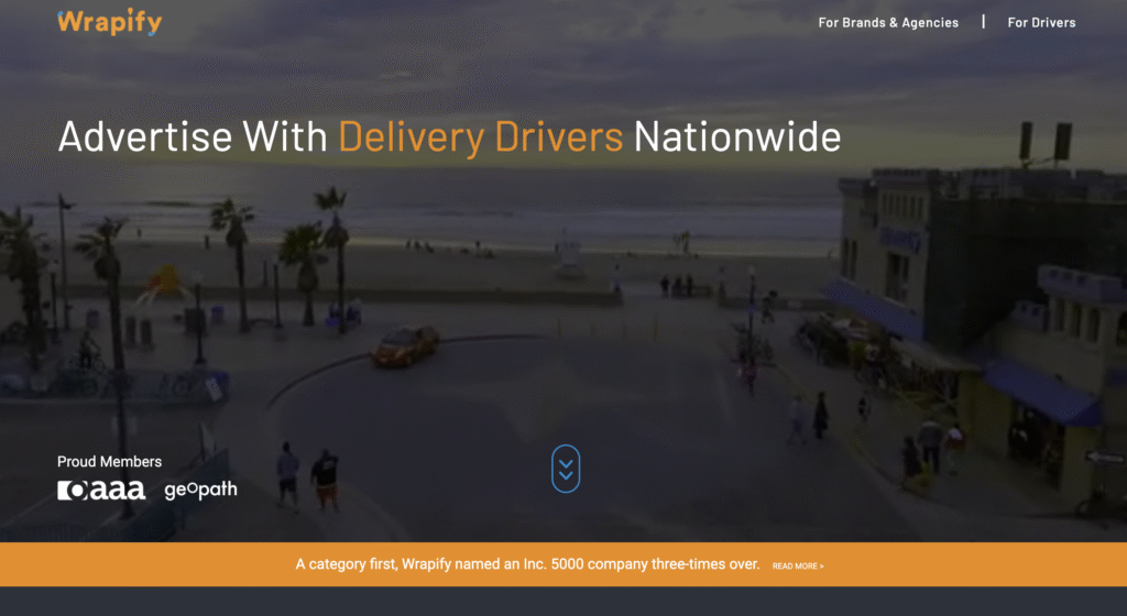 Wrapify homepage featuring a coastal scene with palm trees, beachgoers, and a car, promoting Wrapify's advertising services for delivery drivers.