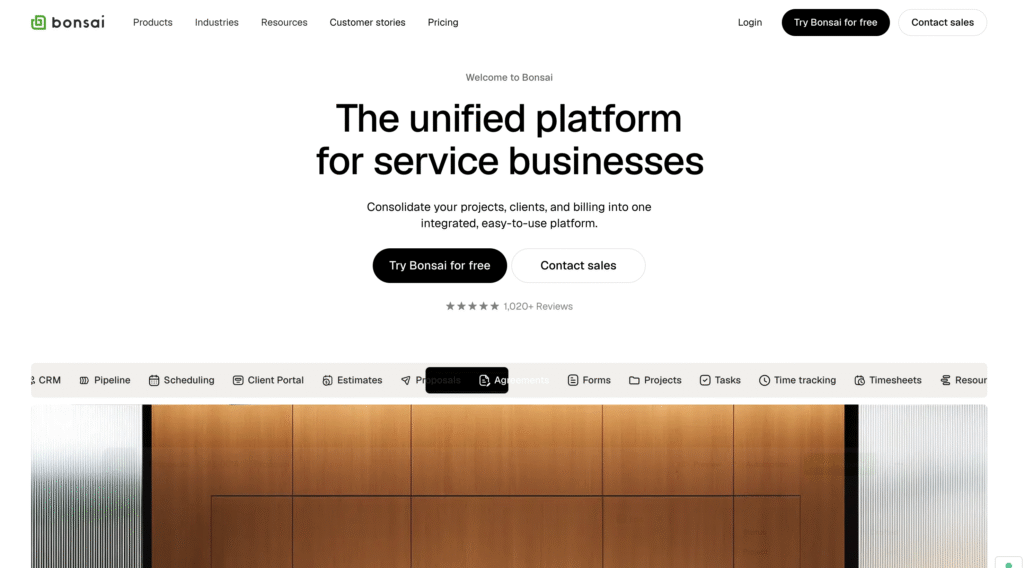 Website landing page for Bonsai, a unified platform for service businesses to manage projects, clients, billing, with options to try free or contact sales.