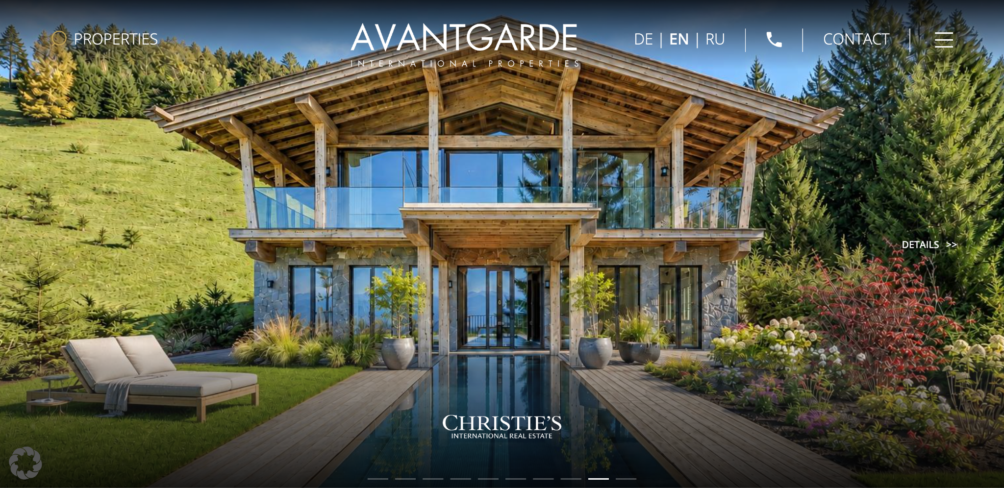 Avantgarde International Properties' homepage showing a full-bleed photo of a luxury alpine villa with a pool