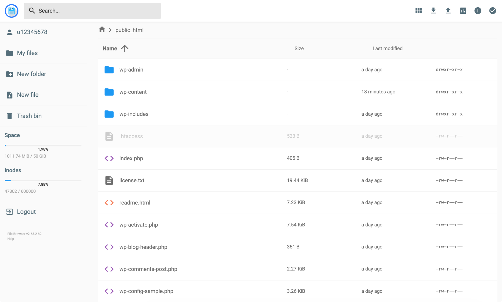 The Hostinger File Manager showing the public_html folder with WordPress files &mdash; wp-admin, wp-content, wp-includes, index.php, and other root files &mdash; sitting directly in the folder with no subfolder.